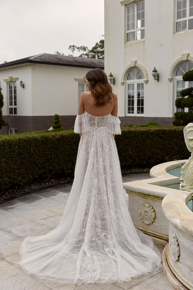 DAYNI ML22120 FULL LENGTH PETITE FLORAL LACE STRAPLESS ALINE GOWN WITH DETACHABLE OFF SHOULDER STRAPS ILLUSION BACK BUTTON AND ZIPPER CLOSURE WEDDING DRESS MADI LANE BRIDAL 3